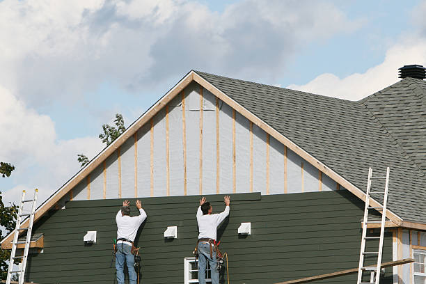 Professional Siding technician working in Waverly, NY
